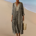 SOFIE | Monochromatyczna maxi sukienka z geometrycznym wzorem – Elegancki krój w czerni i beżu